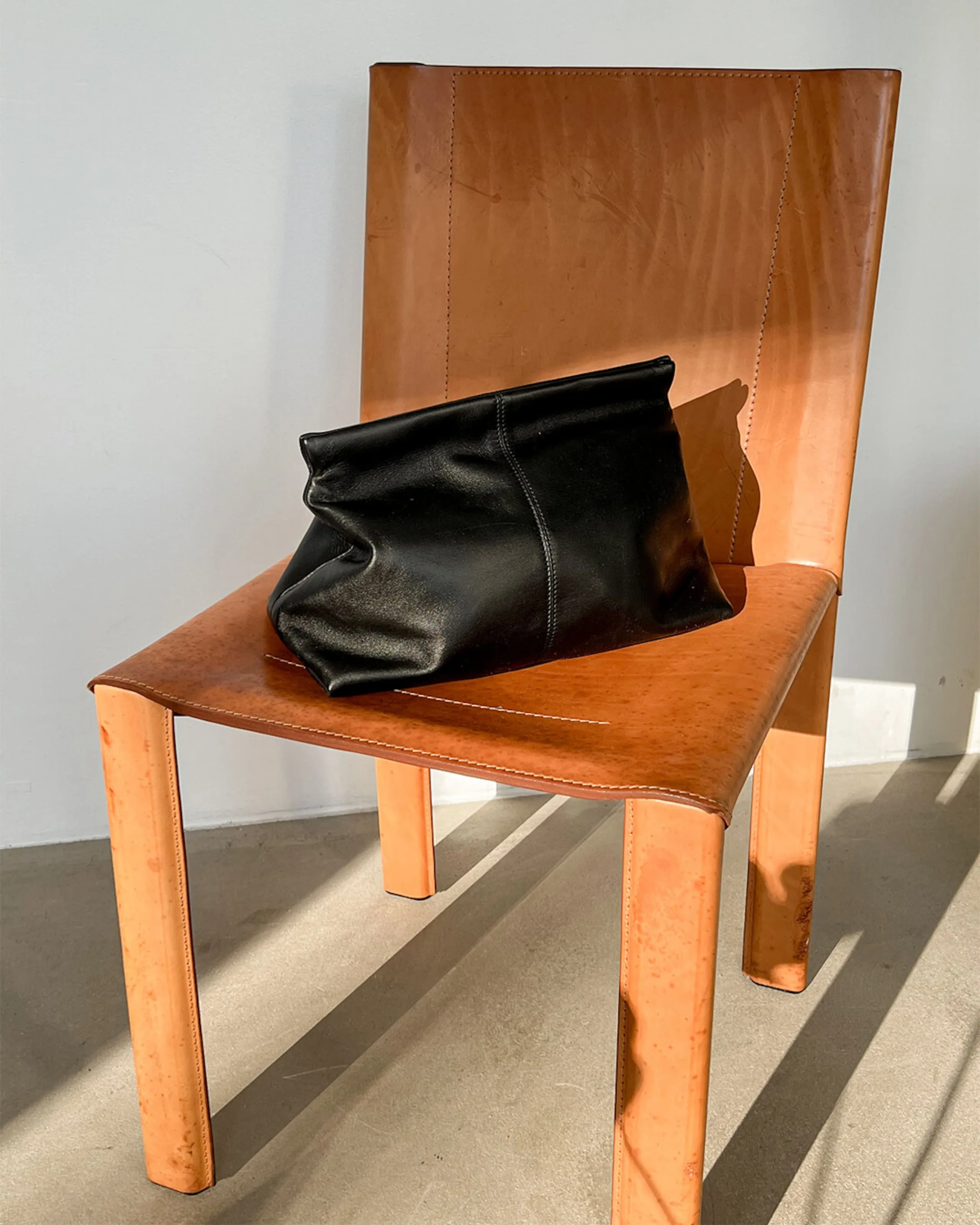 Clay Black Clutch Bag
