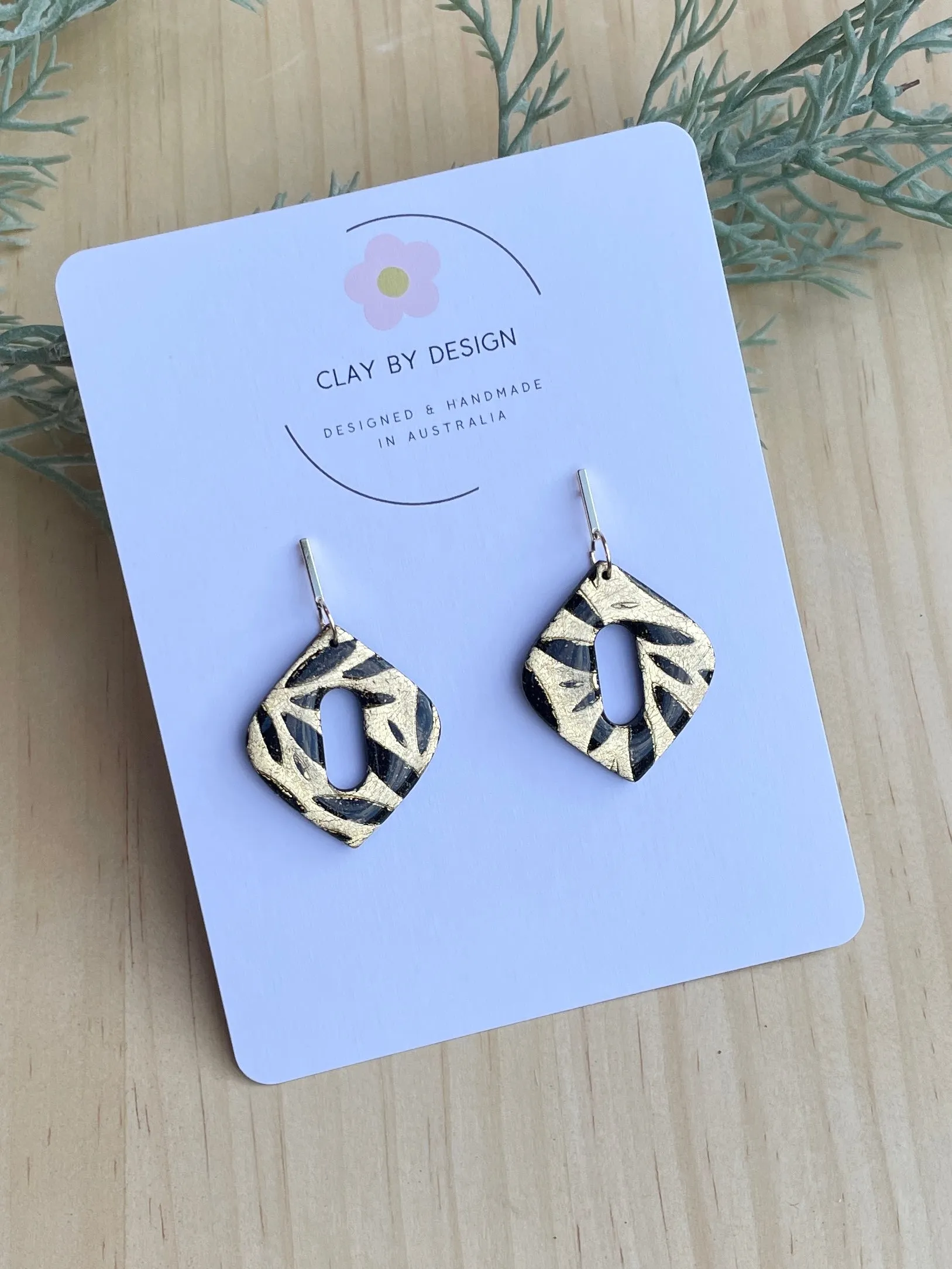 Gold and black diamond shape dangles