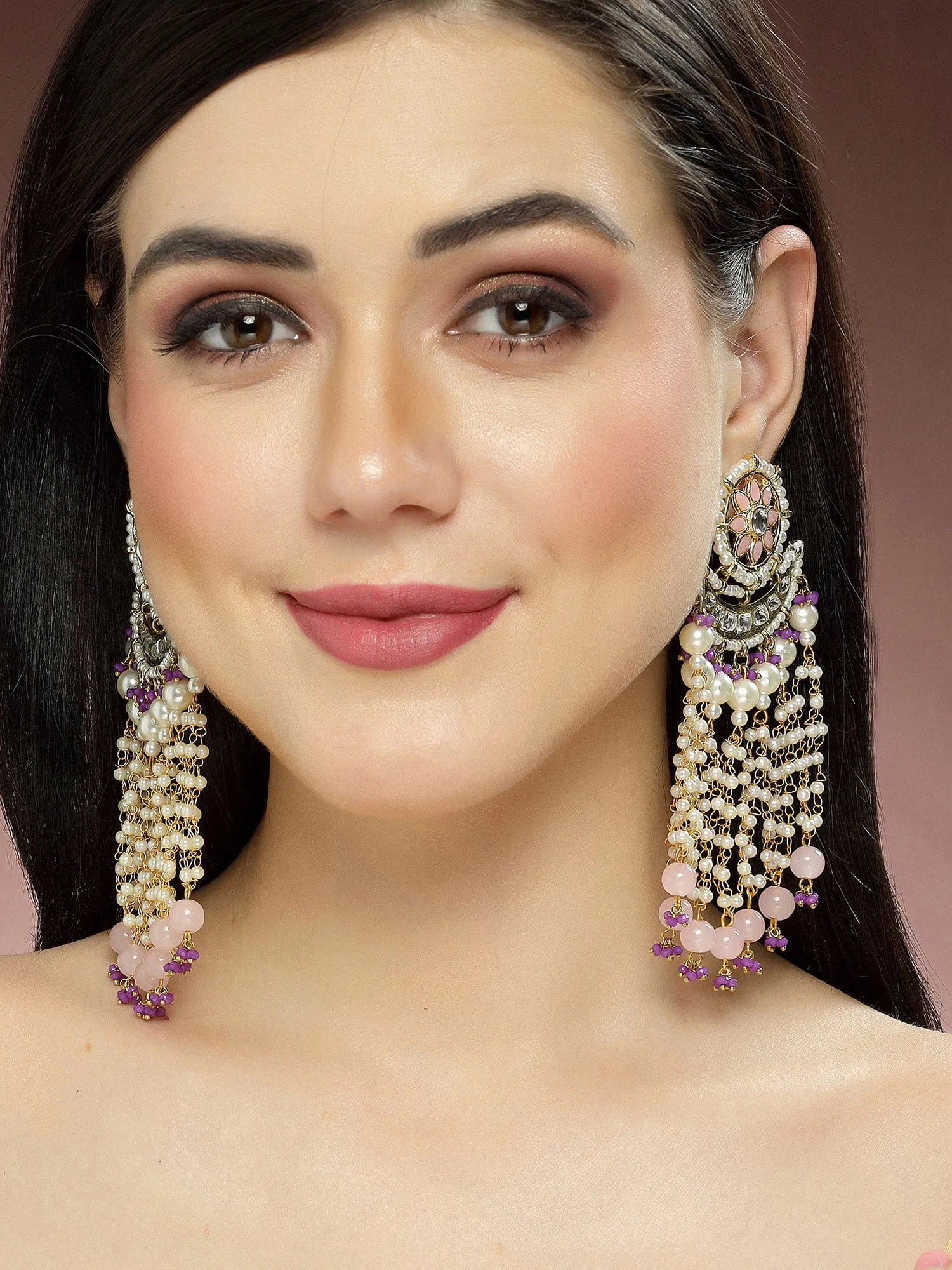 Karatcart Gold Plated Pink Beads Purple Crystals Kundan Tassel Earrings for Women