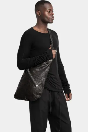 Large stapled crossbody leather bag