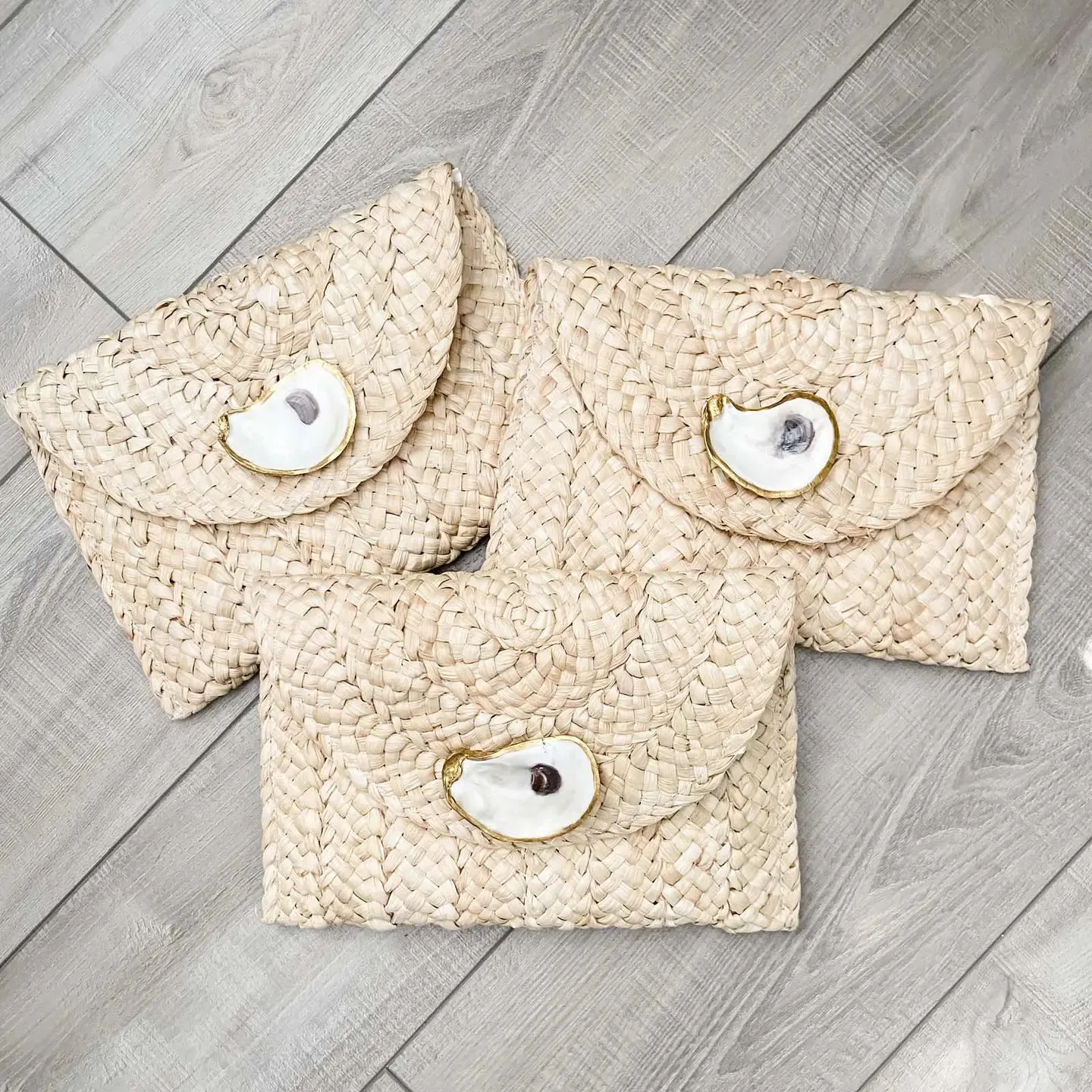 Oyster Shell Straw Clutch By Maidstone