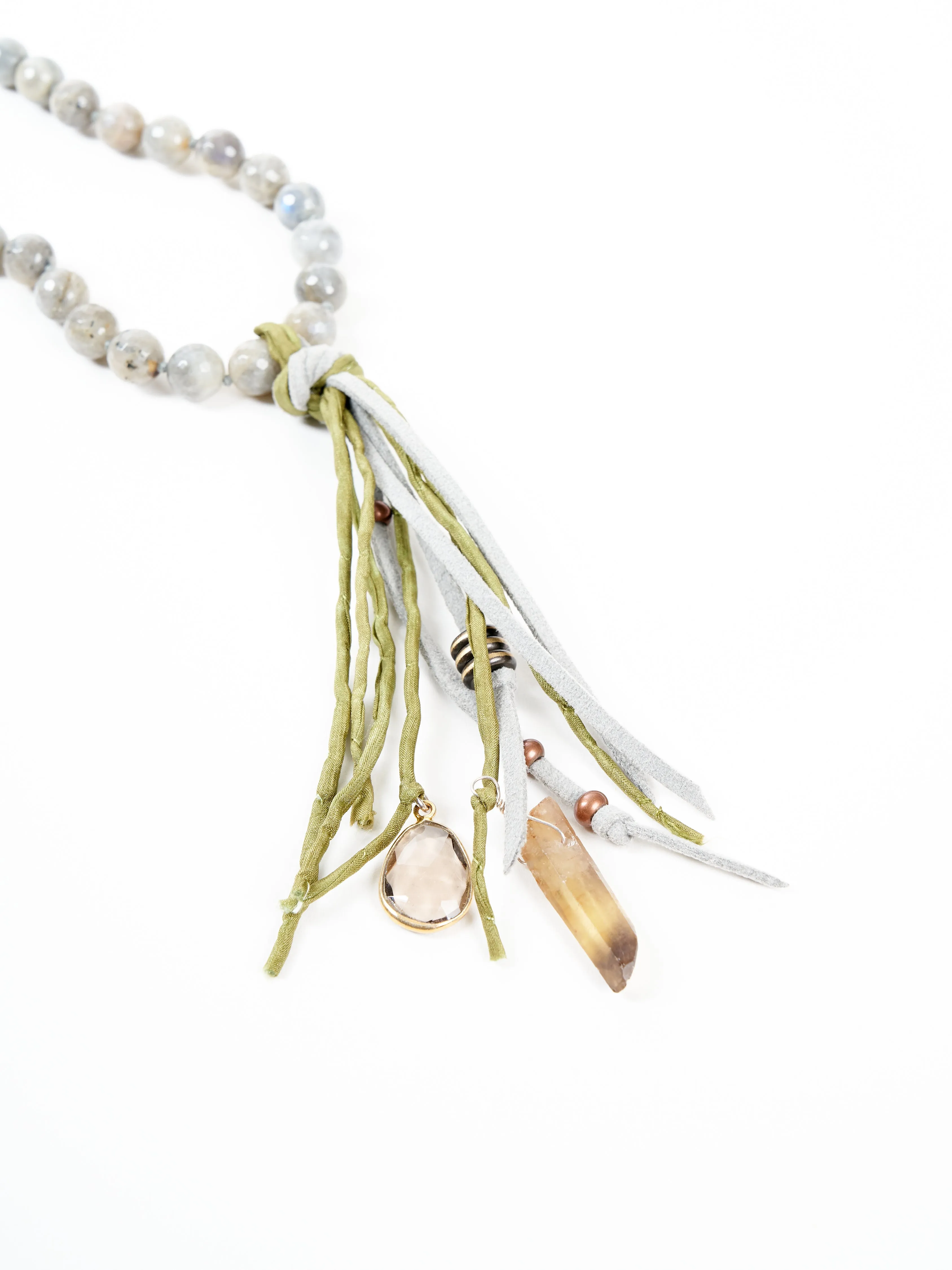 precious stone with leather and silk tassel