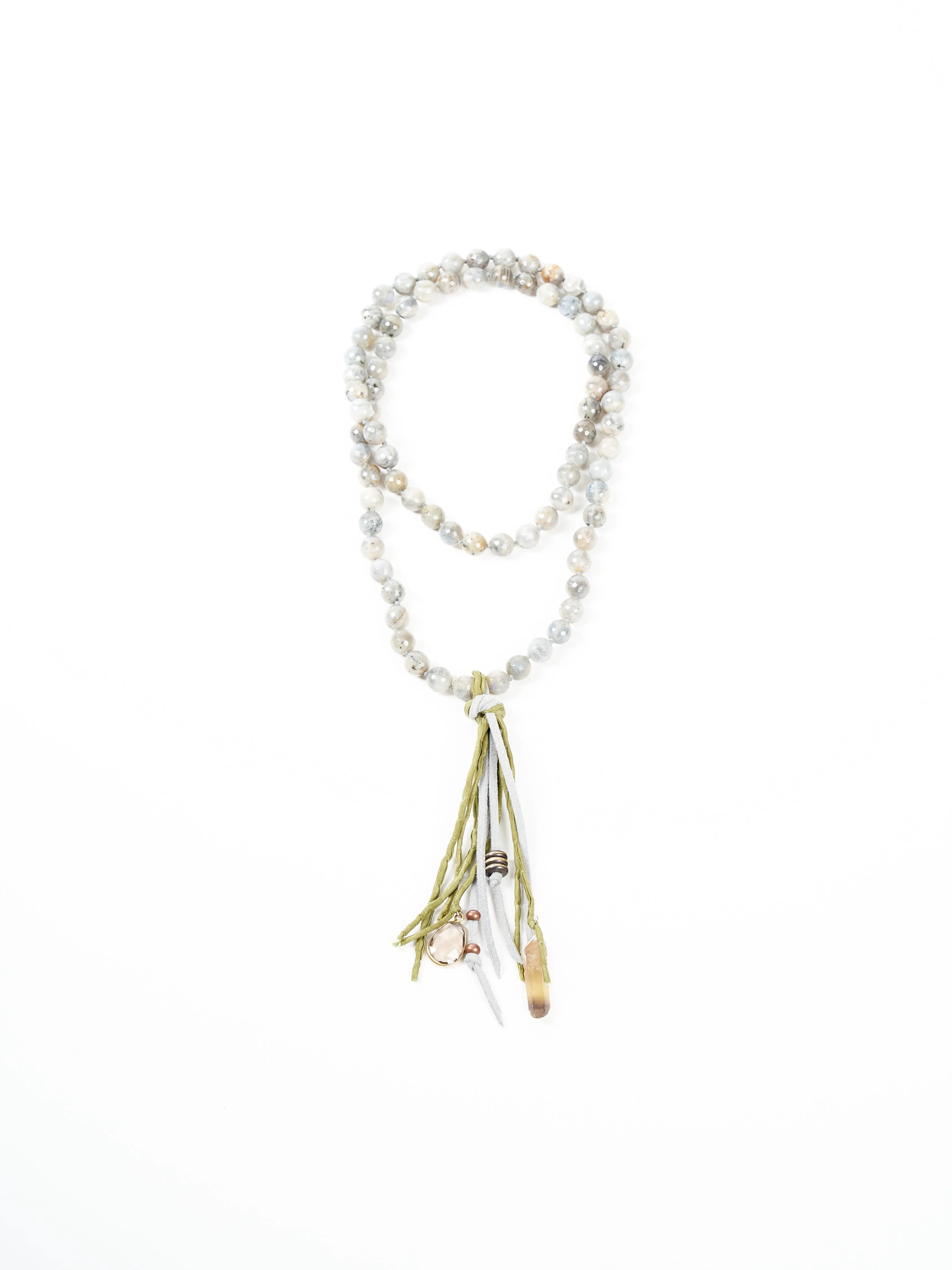 precious stone with leather and silk tassel