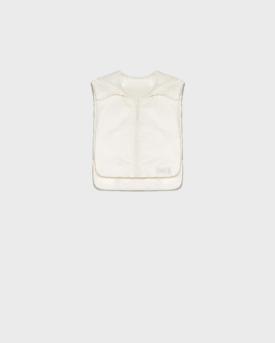 Reversible down-filled bib in matte and shiny water-repellent technical fabric