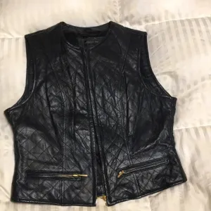 Vintage Otello Pelle quilted leather vest